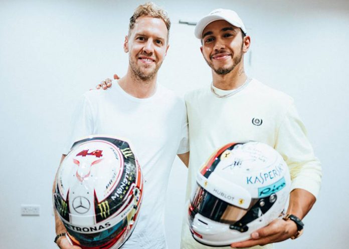 Sebastian Vettel y Lewis Hamilton intercambian cascos en Abu Dhabi